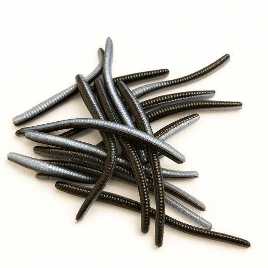 Stack of black and gray fishing lures on a white background