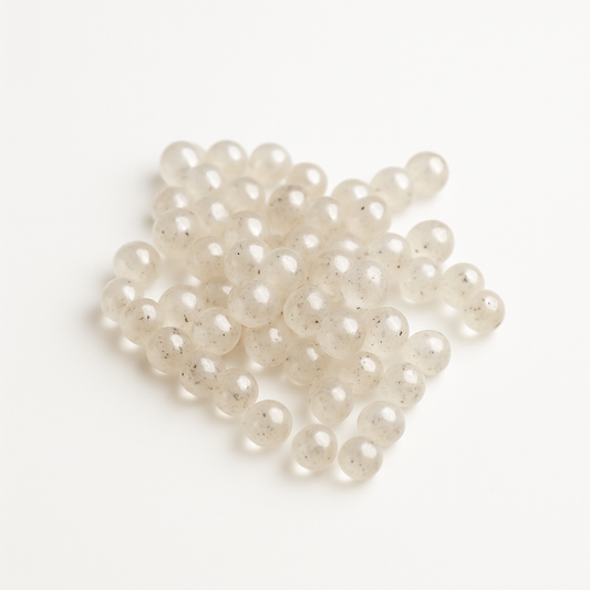 White pearls on a white background